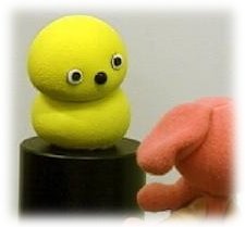 photo: Keepon looking at a toy